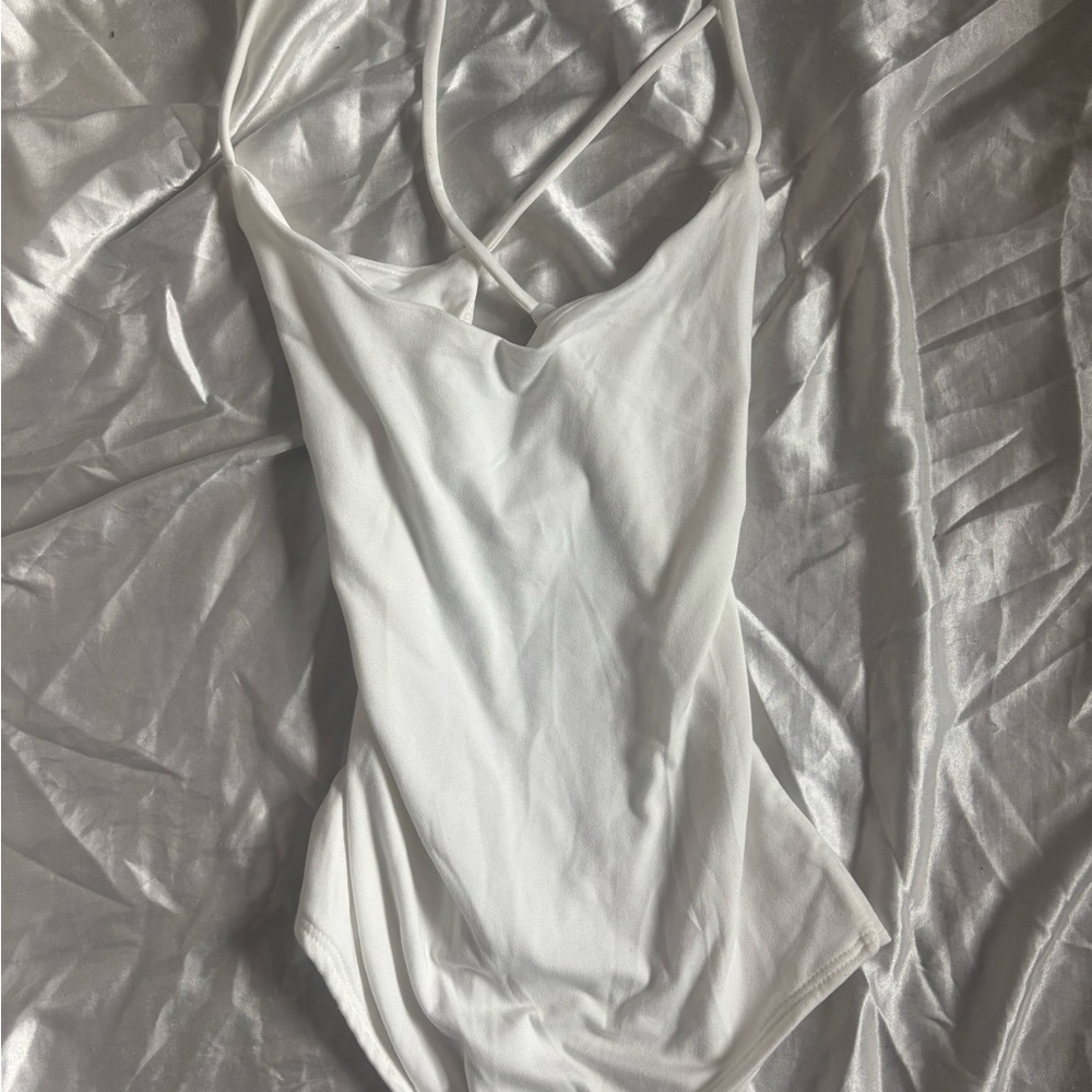 Stylish White Cross-Back Bodysuit
